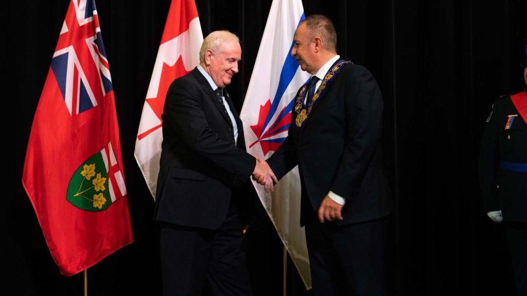 David Van Slingerland is accepting the Order of Vaughan from Mayor Maurizio Bevilacqua